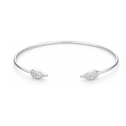 Studio view of an open cuff bangle featuring leaf-shaped end elements accented with small cubic zirconia stones in a smooth silver tone finish.